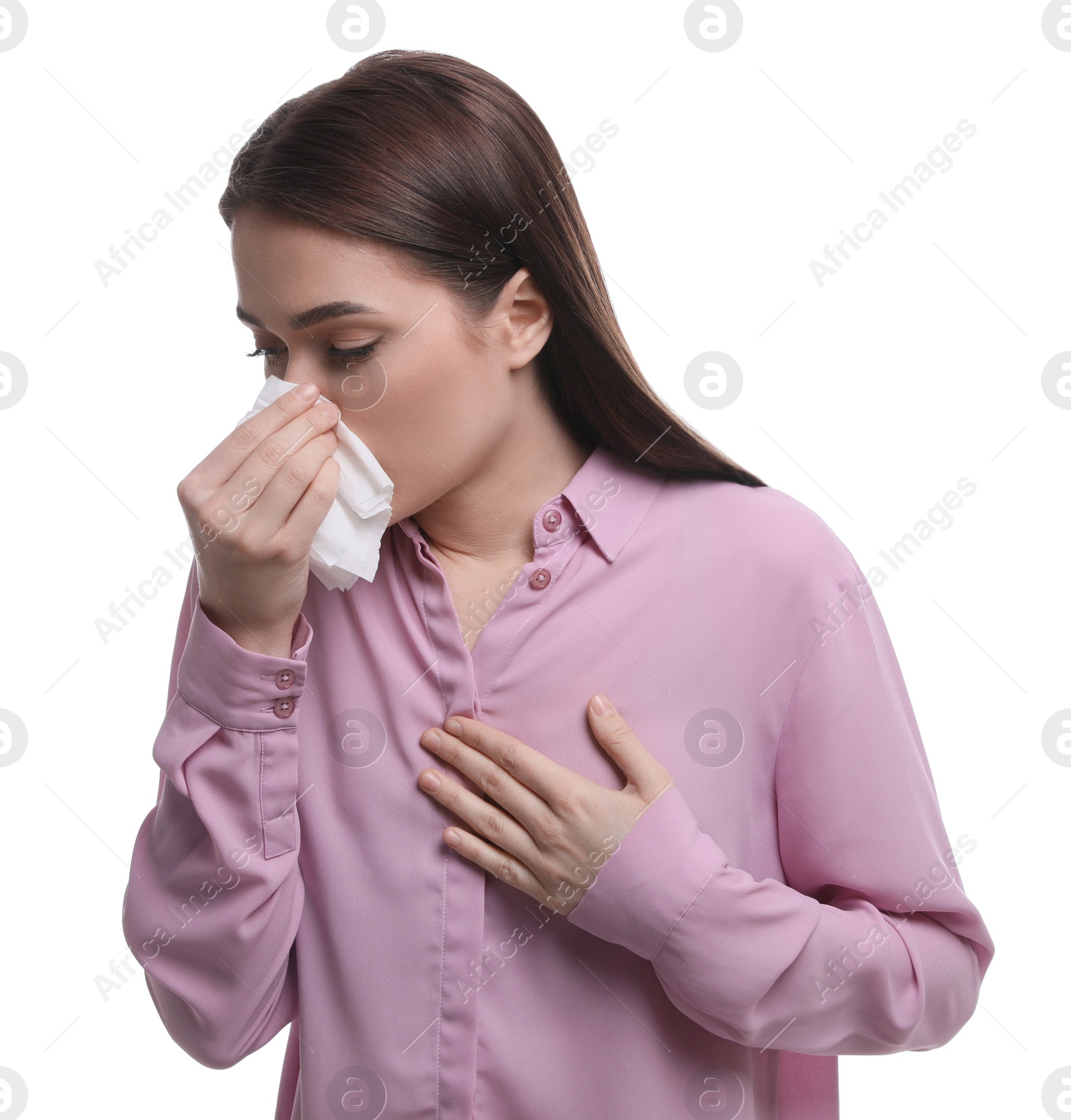 Photo of Woman blowing nose on white background. Cold symptoms