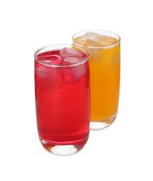 Glasses of different refreshing soda water with ice cubes on white background