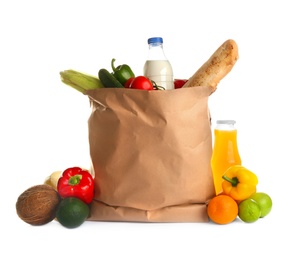 Photo of Paper bag full of products on white background