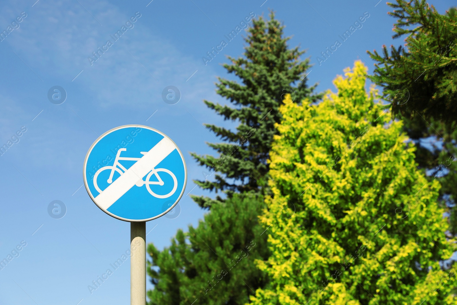 Photo of Road sign End Of Cycleway against blue sky. Space for text