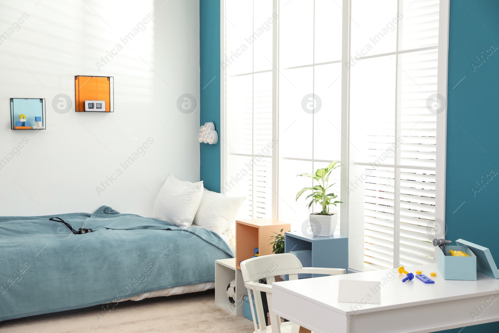 Image of Stylish child room interior design inspired by color of the year 2020 (bleached coral)
