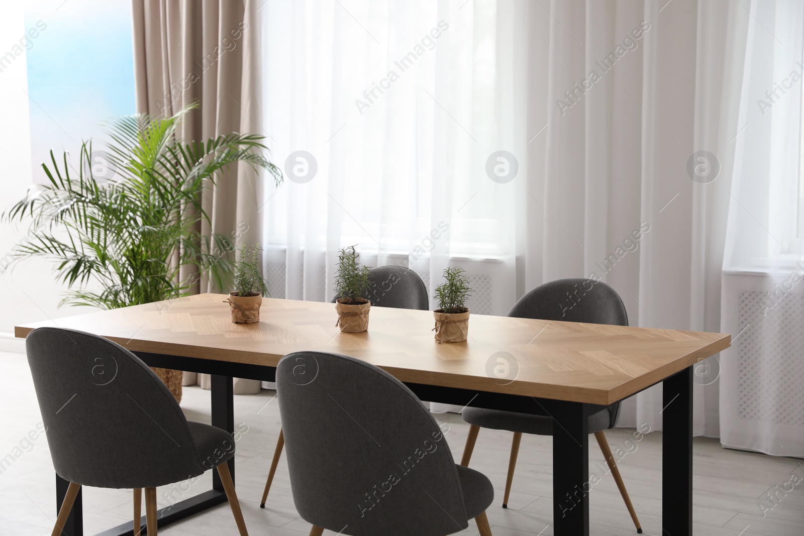 Photo of Modern room interior with chairs and table