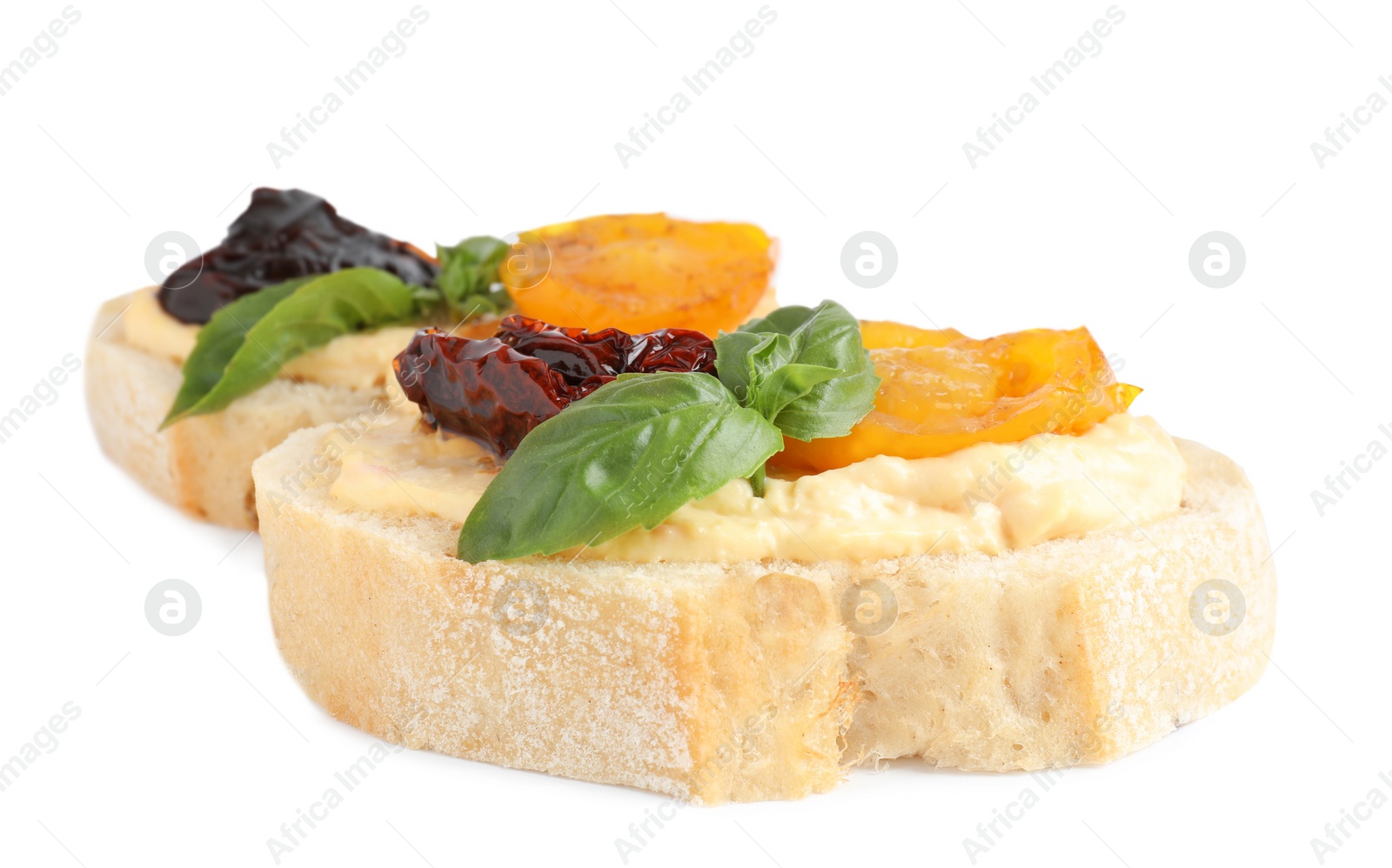 Photo of Tasty fresh tomato bruschettas on white background