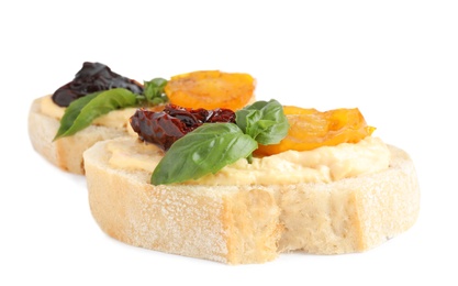 Photo of Tasty fresh tomato bruschettas on white background