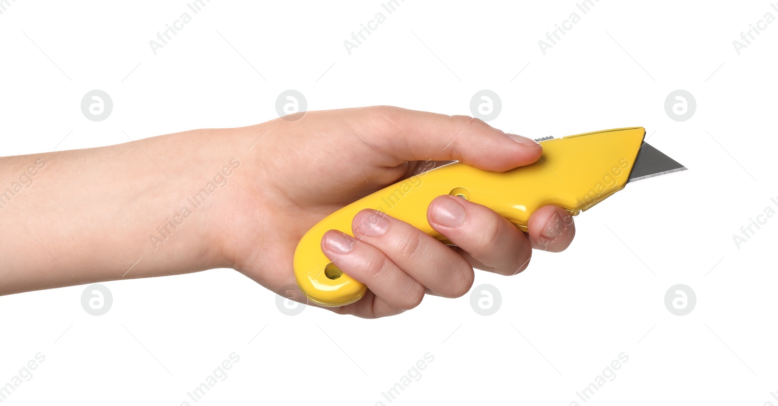 Photo of Woman holding utility knife on white background, closeup