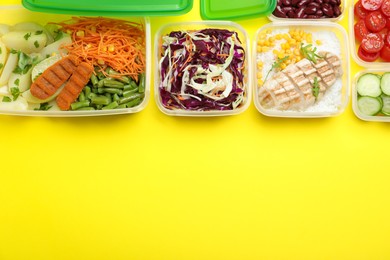 Set of plastic containers with fresh food on yellow background, flat lay. Space for text