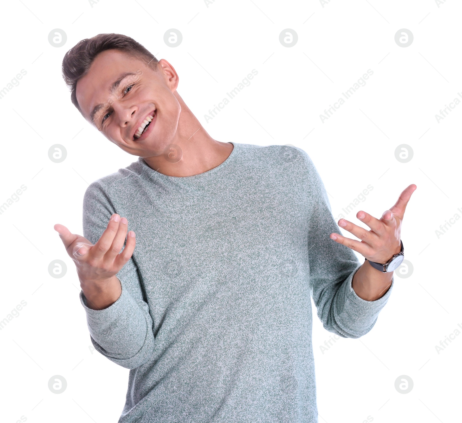 Photo of Portrait of handsome young man laughing on white background