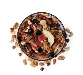 Bowl with mixed dried fruits and nuts on white background, top view