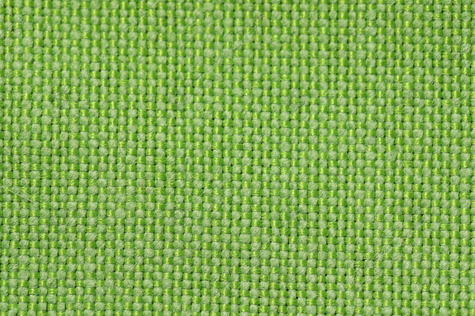 Photo of Texture of green fabric as background, top view