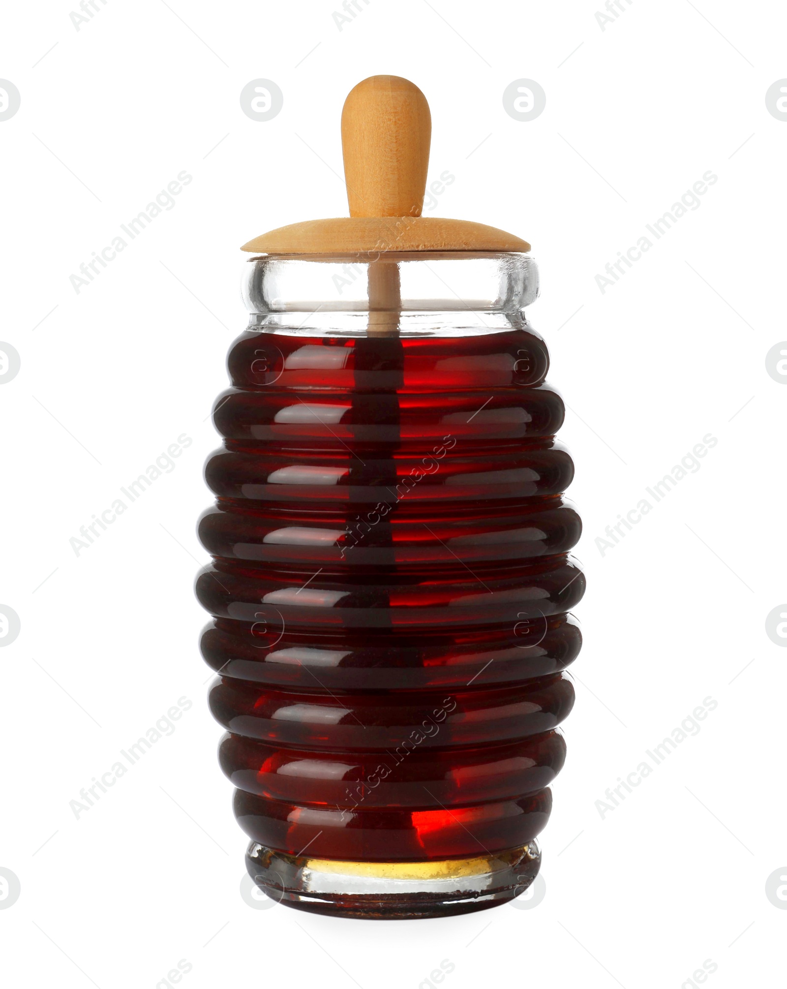 Photo of Jar with organic honey and dipper isolated on white