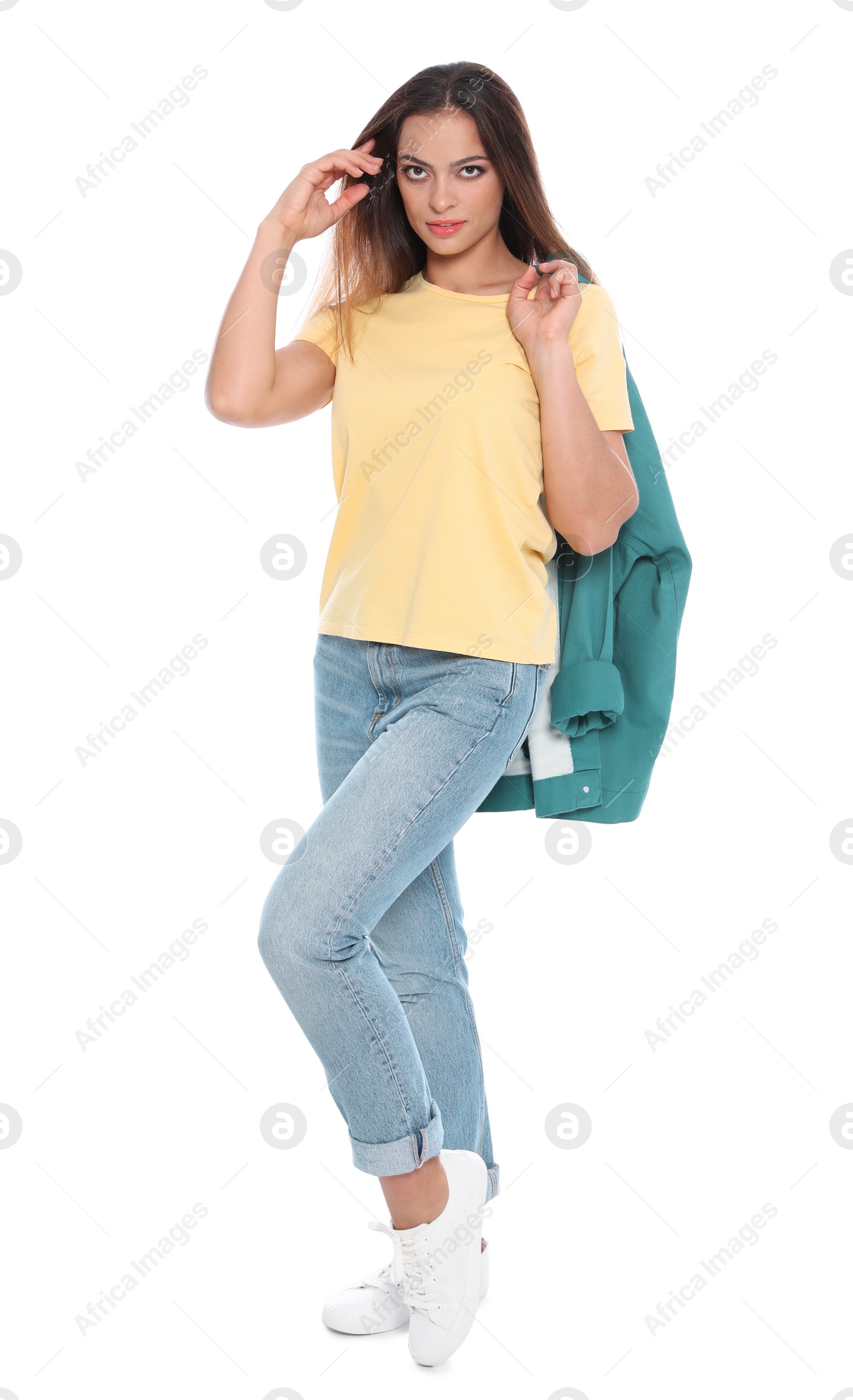 Photo of Full length portrait of beautiful young woman in casual outfit on white background