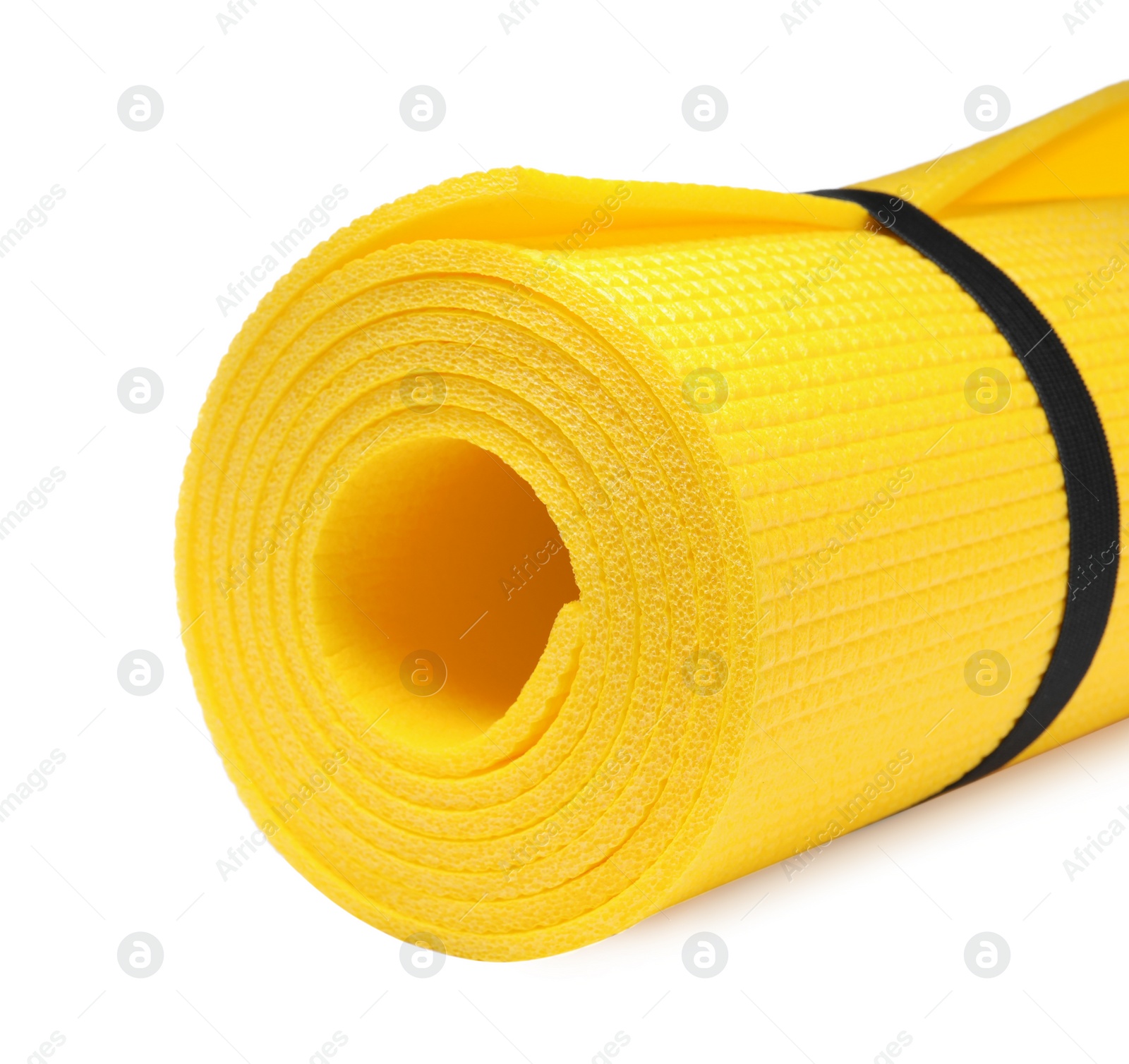 Photo of Rolled camping mat on white background, closeup