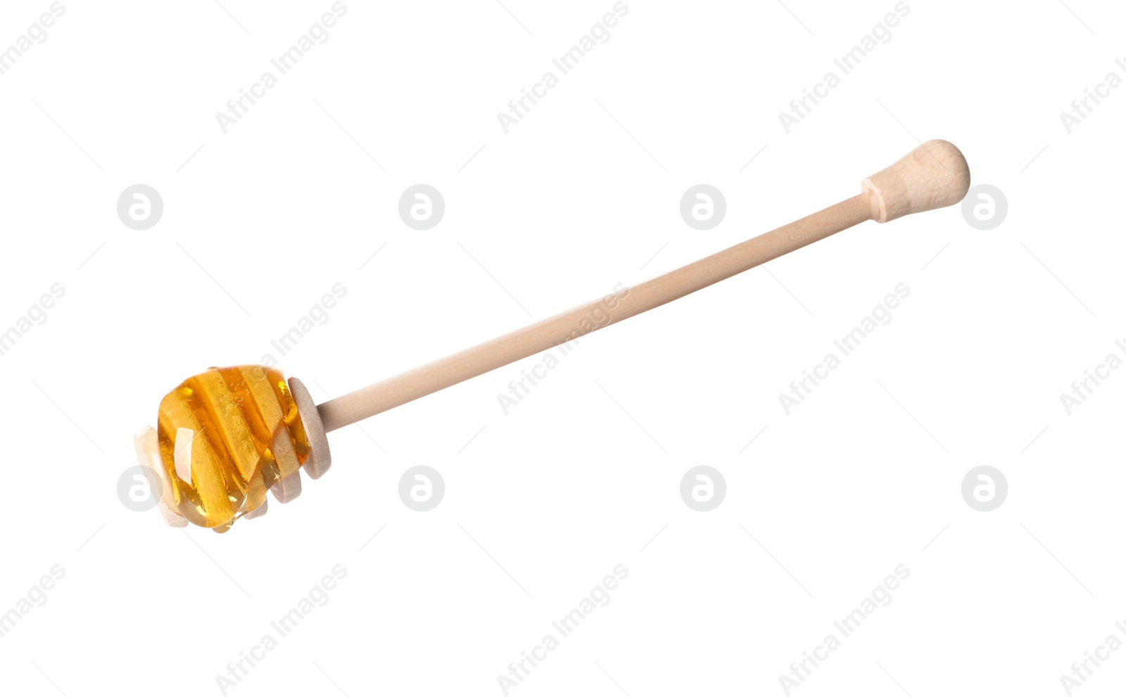 Photo of Fresh honey flowing down from dipper on white background