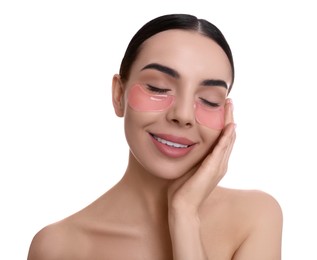 Photo of Beautiful young woman with under eye patches on white background