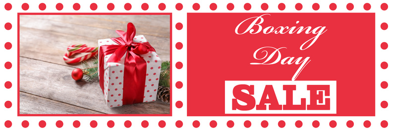 Boxing Day Sale banner design. Gift on wooden table and text