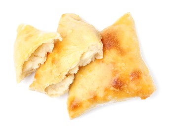 Photo of Delicious samosas isolated on white, top view. Homemade pastry