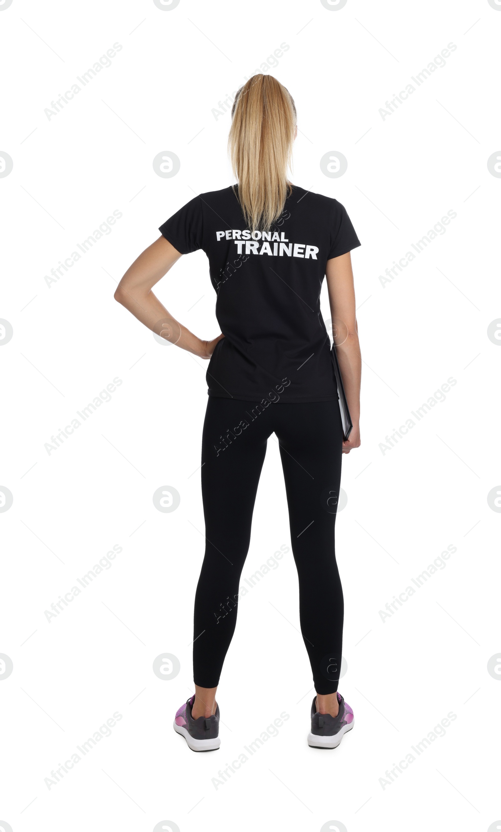 Photo of Personal trainer with clipboard on white background, back view. Gym instructor