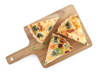 Pieces of delicious homemade quiche with salmon and broccoli isolated on white, top view