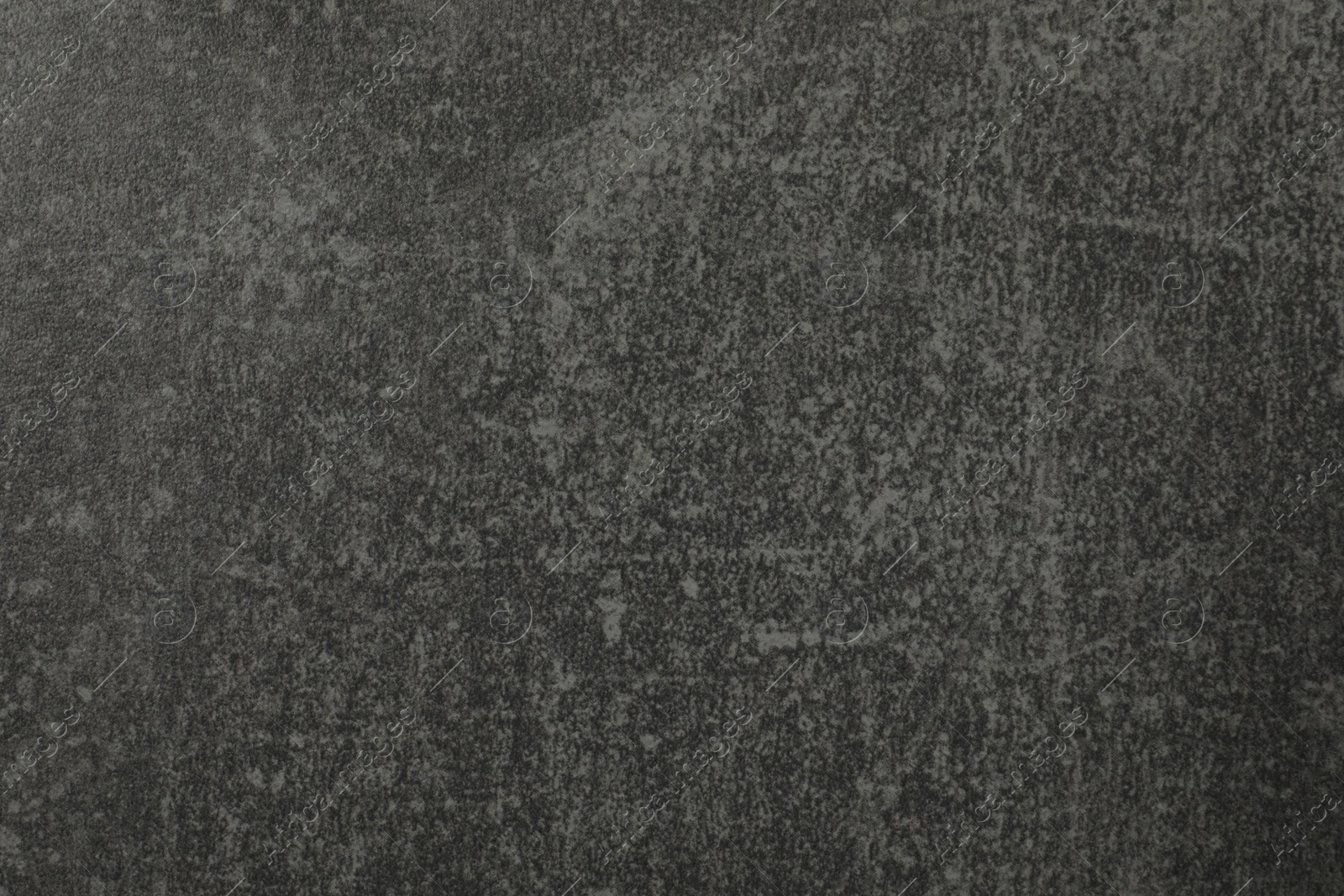 Photo of Texture of grey stone surface as background, closeup