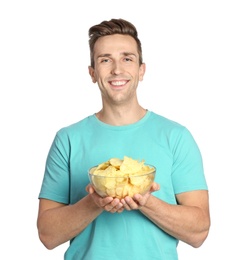 Photo of Man with bowl of potato chips on white background