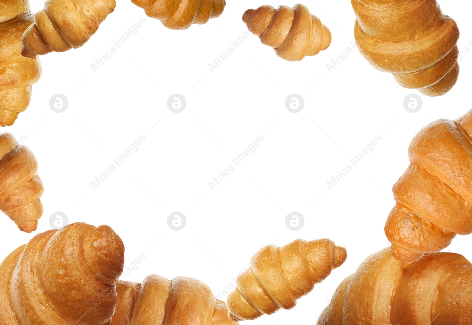 Image of Crusty golden croissants falling on white background