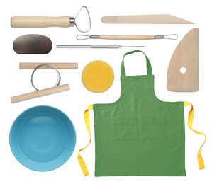 Image of Set of pottery tools, apron and ceramic bowl on white background