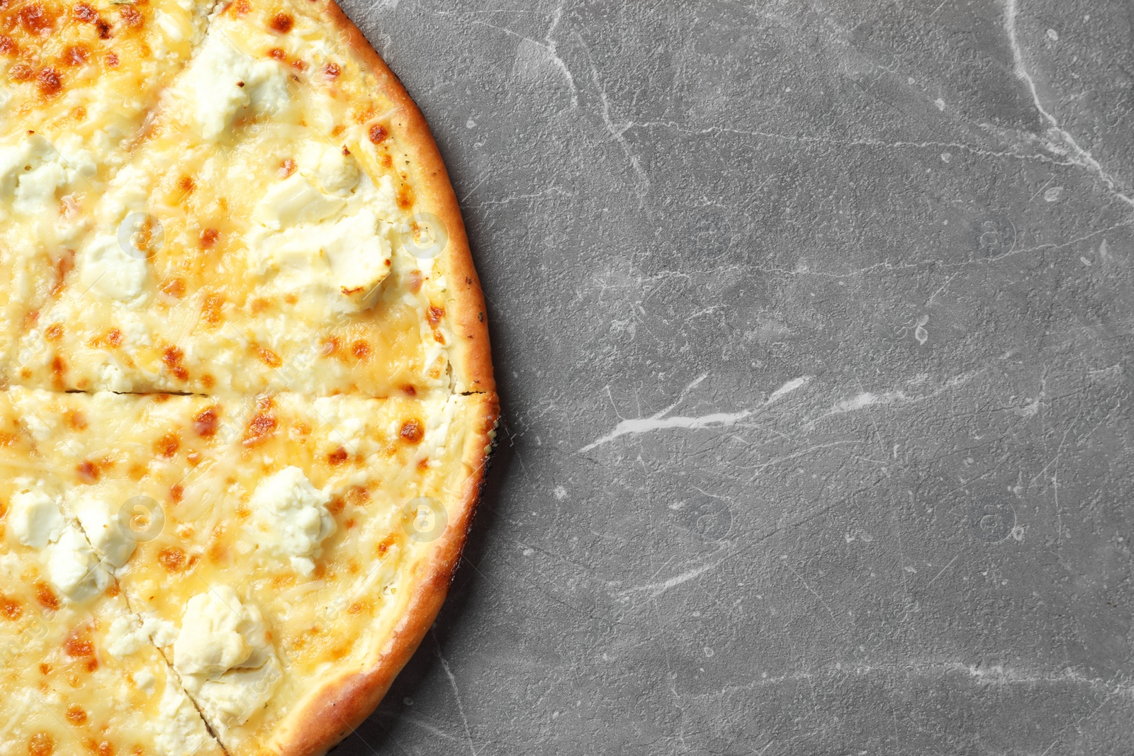 Photo of Delicious cheese pizza on grey background, top view