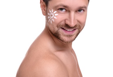 Handsome man with sun protection cream on his face against white background, closeup