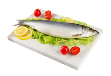 Photo of Board with salted herring, slices of lemon, lettuce and cherry tomatoes isolated on white