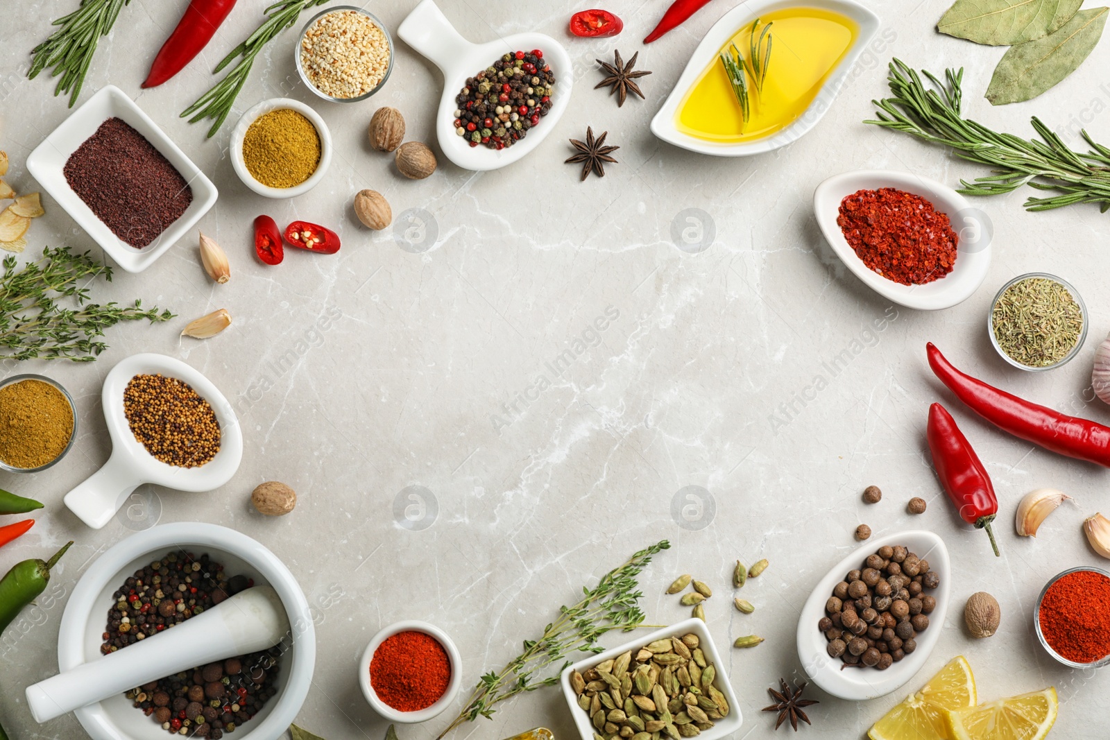 Photo of Flat lay composition with different aromatic spices and space for text on table