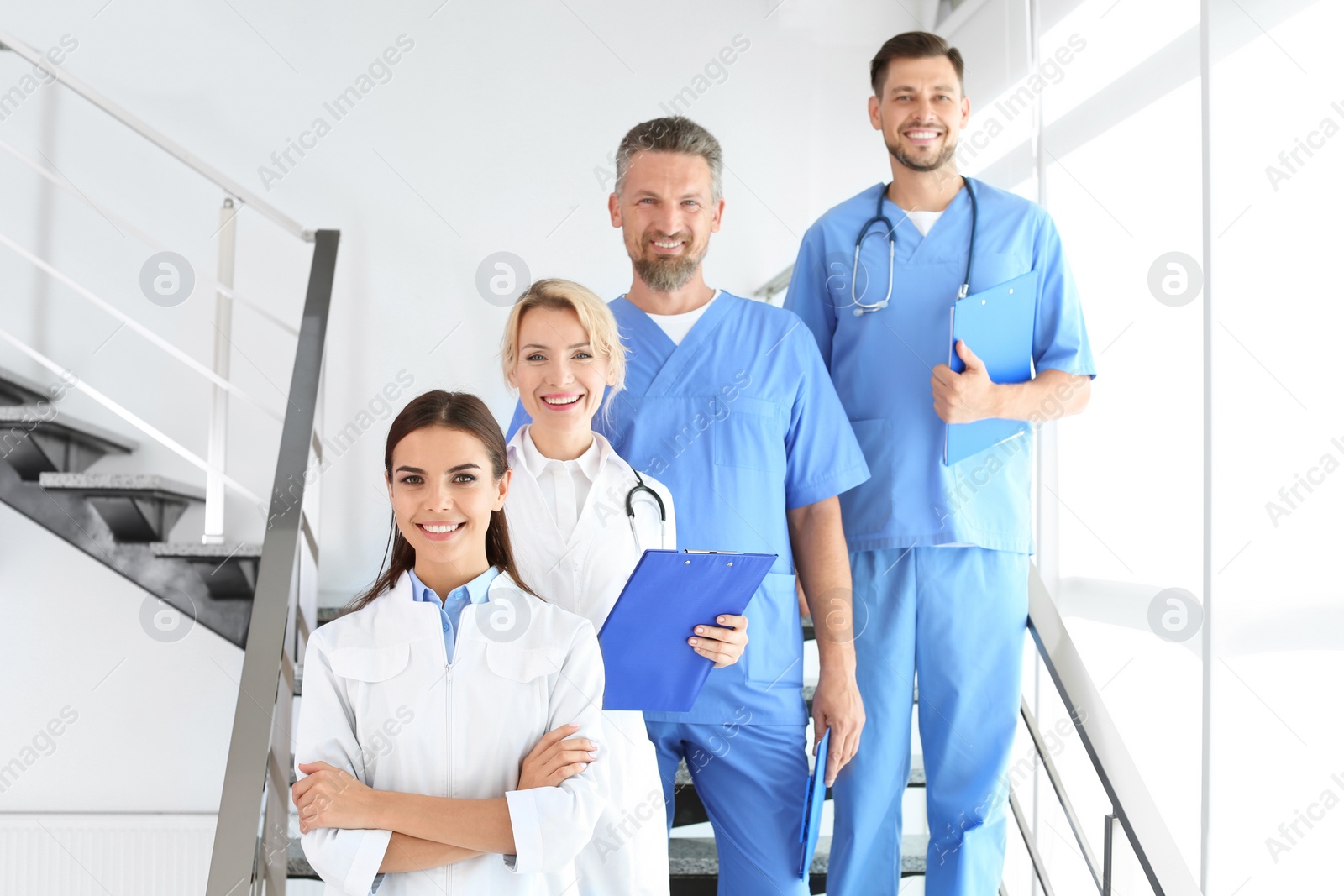 Photo of Doctors and medical assistants in clinic. Health care service