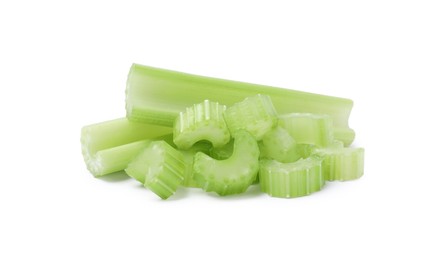 Photo of Fresh cut celery stalks on white background
