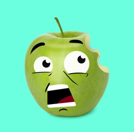 Creative artwork. Emotional green bitten apple. Fruit with drawings on mint color background