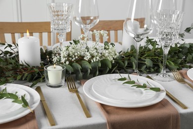 Stylish elegant table setting for festive dinner indoors