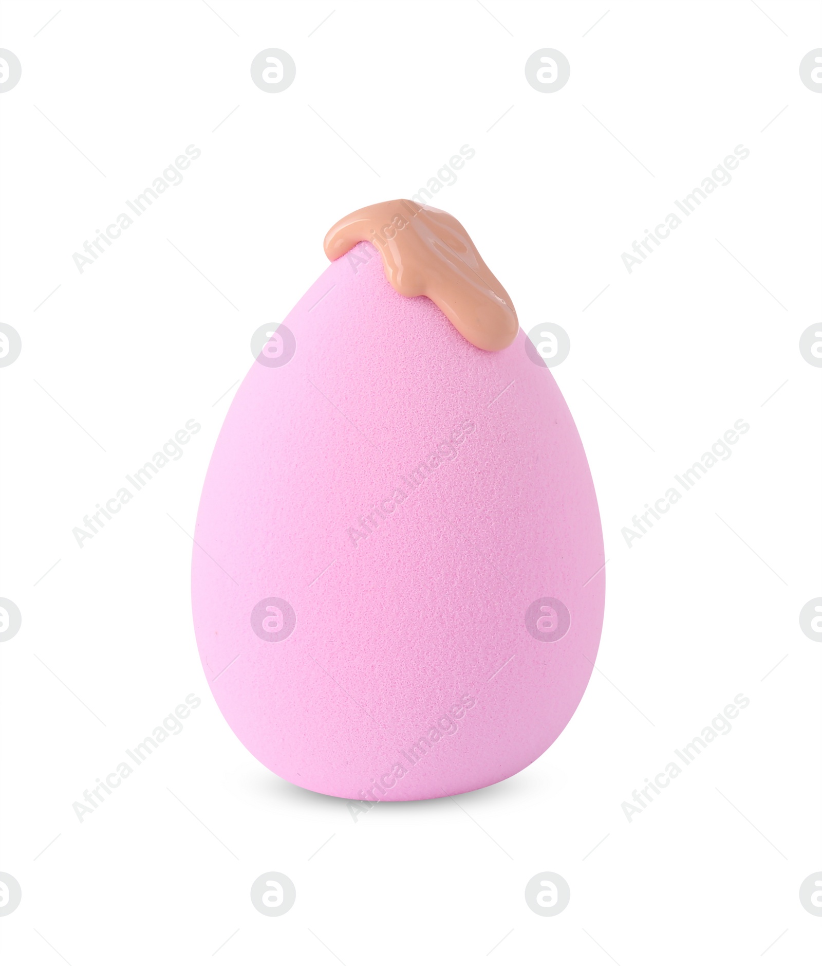 Photo of Pink makeup sponge with skin foundation isolated on white