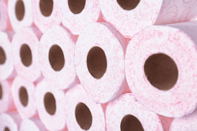 Photo of Many rolls of toilet paper as background. Personal hygiene