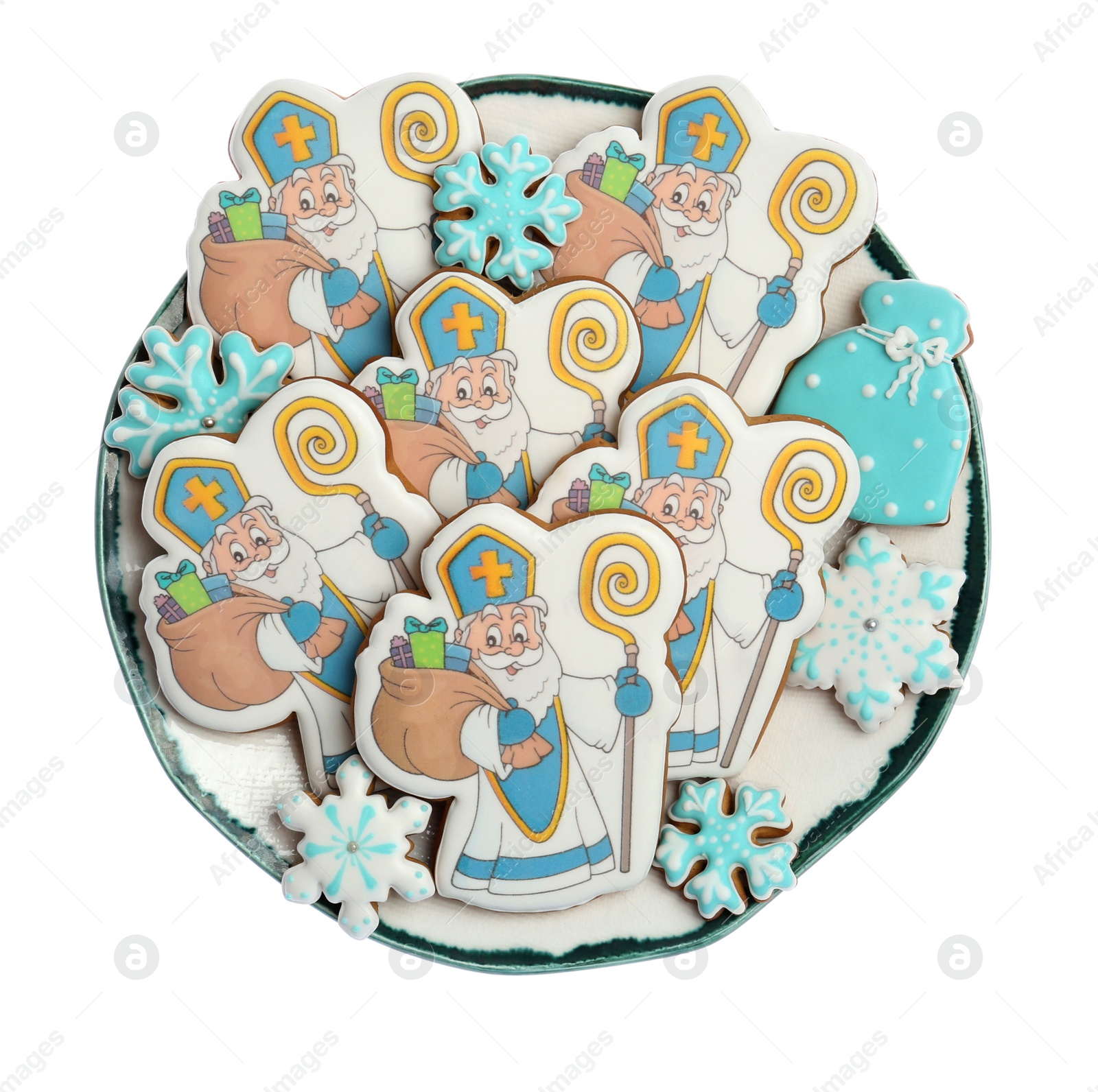 Photo of Tasty gingerbread cookies on white background, top view. St. Nicholas Day celebration