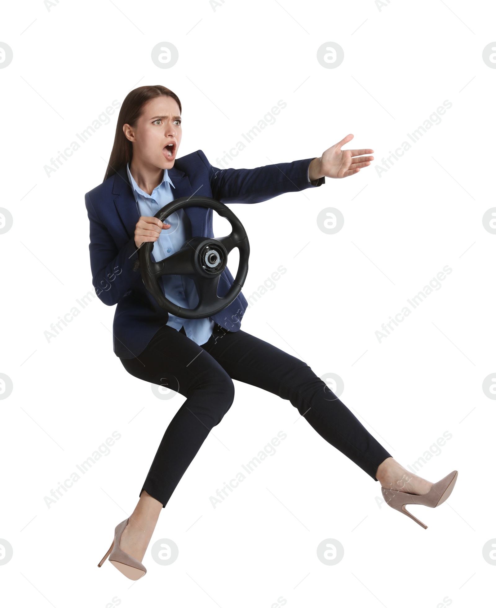 Photo of Angry woman with steering wheel against white background