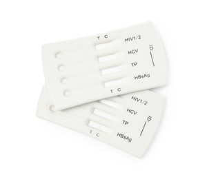 Photo of Two disposable express tests for hepatitis on white background, top view