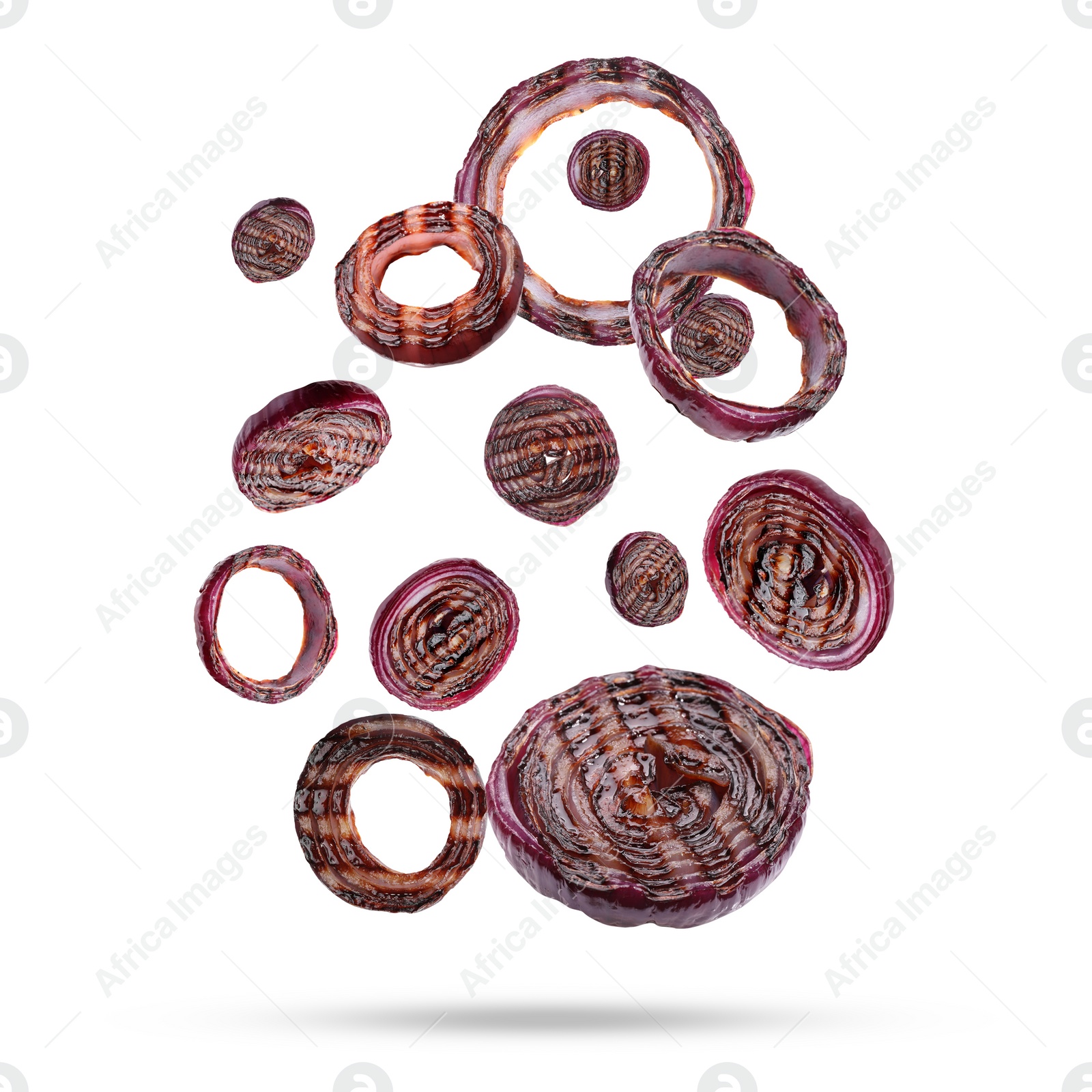 Image of Grilled onion rings in air on white background