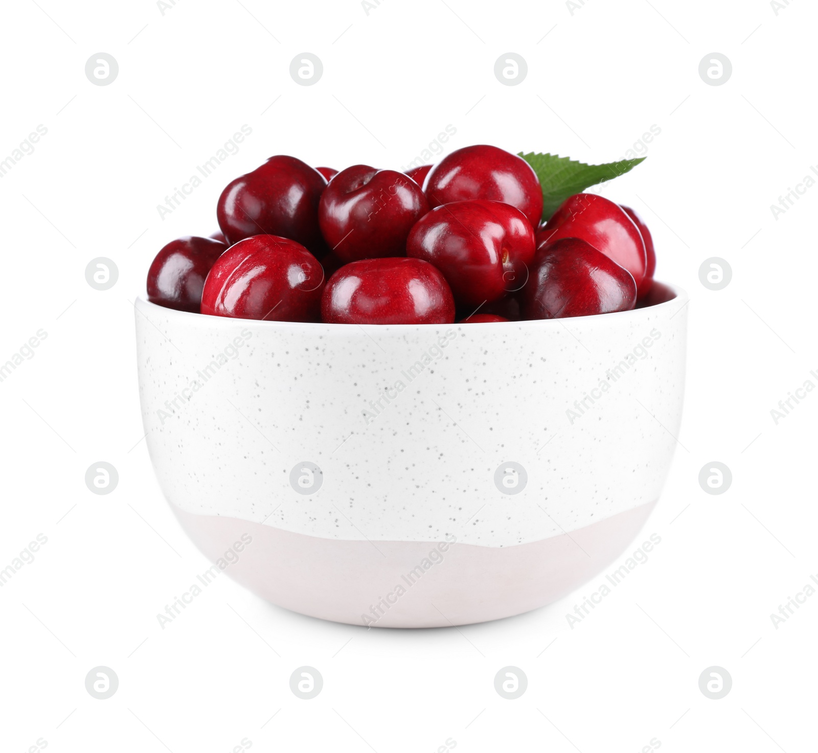 Photo of Tasty ripe red cherries in bowl isolated on white