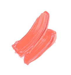 Photo of Strokes of color lip gloss isolated on white, top view