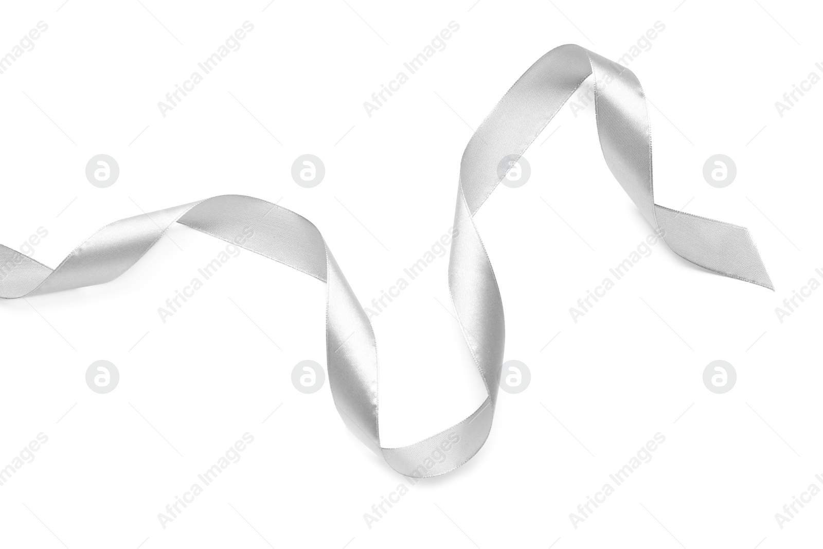 Photo of Beautiful silver ribbon isolated on white, top view