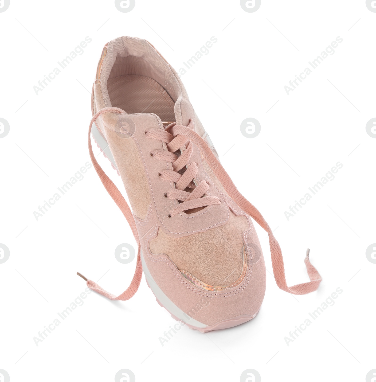 Photo of Stylish pink sneaker with shoelaces on white background