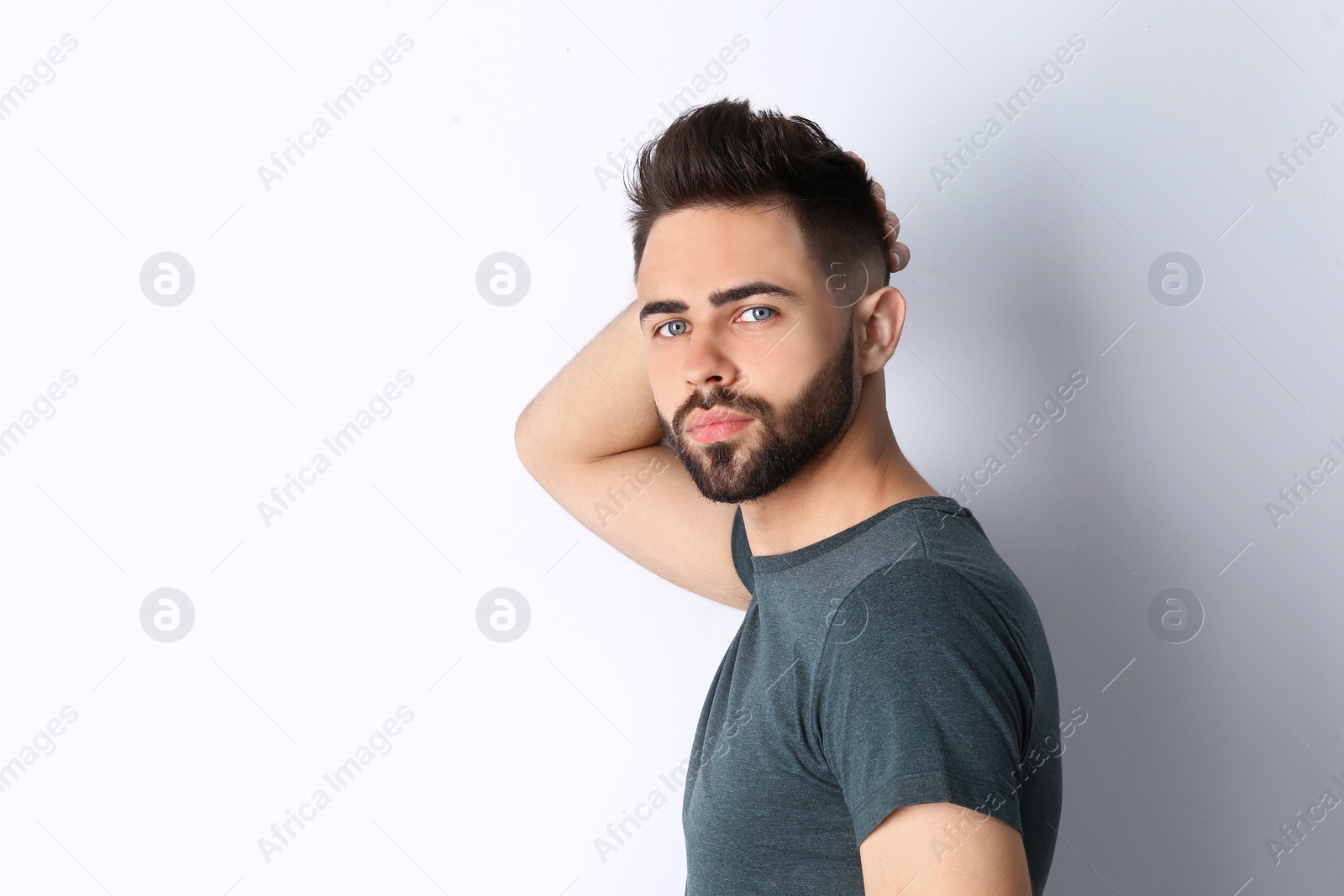 Photo of Portrait of handsome confident man isolated on white