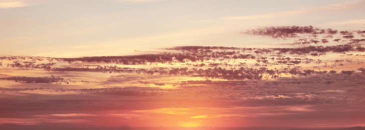 Image of Beautiful cloudy sky at sunset, banner design