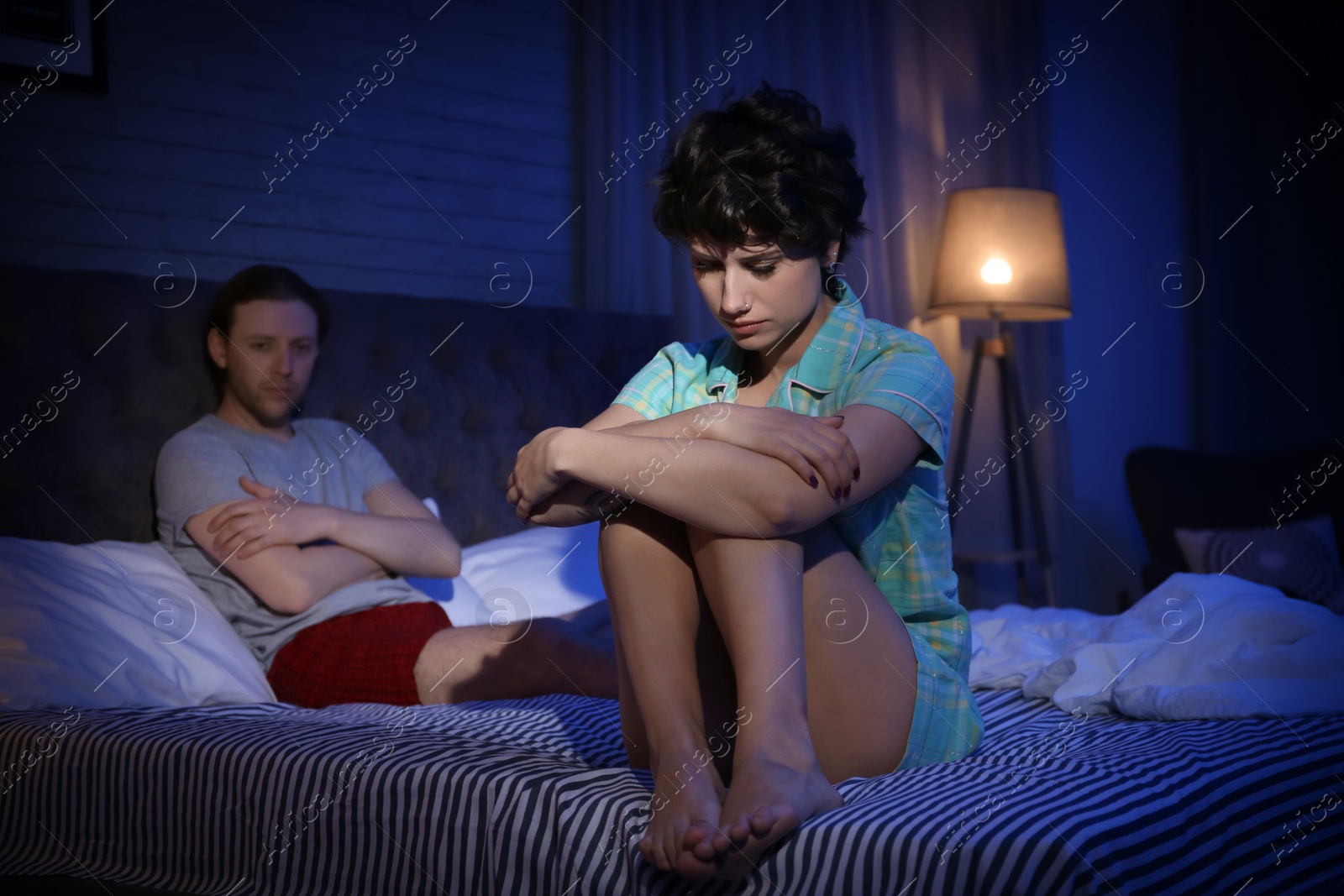 Photo of Young couple with relationship problem at home