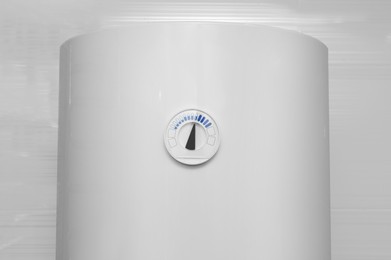 White boiler with temperature control indicator indoors