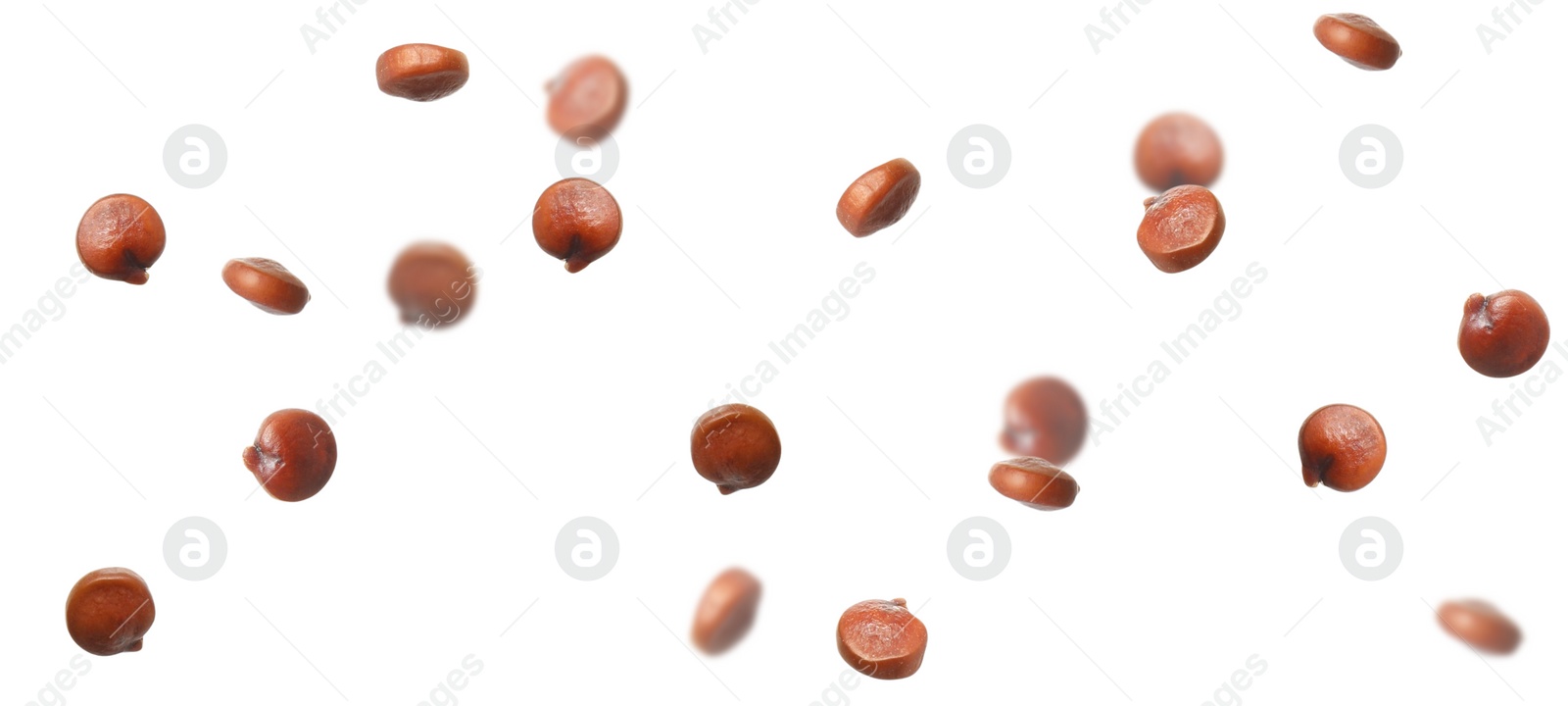 Image of Many quinoa seeds falling on white background, banner design. Vegan diet 