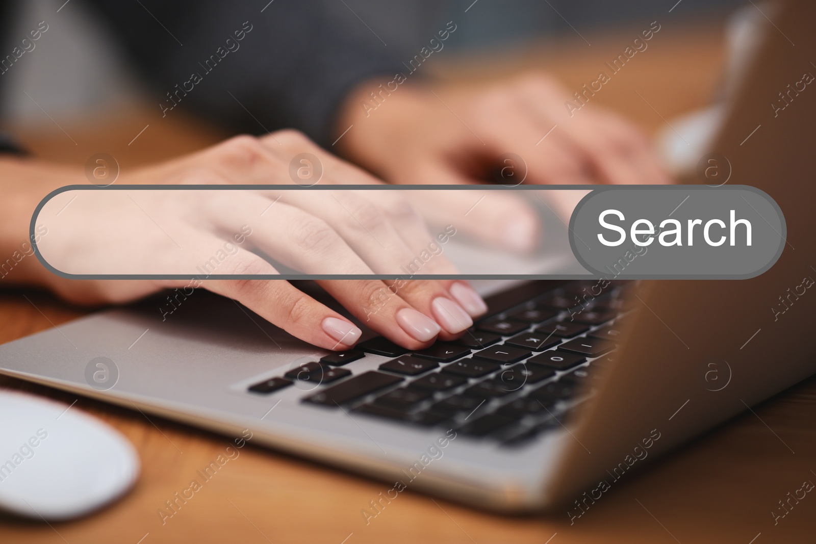 Image of Search bar of internet browser and woman working with laptop at table indoors, closeup